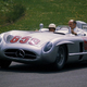 Moss driving his Mercedes 300 SLR at the Nürburgring in 1977.